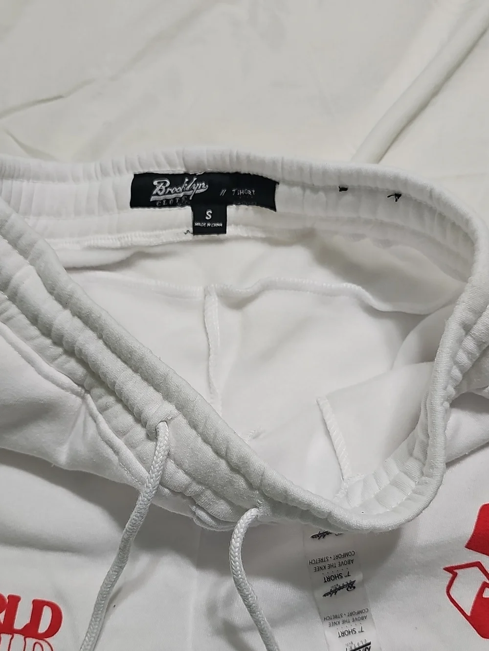 White Graphic Men’s Shorts - One World Design